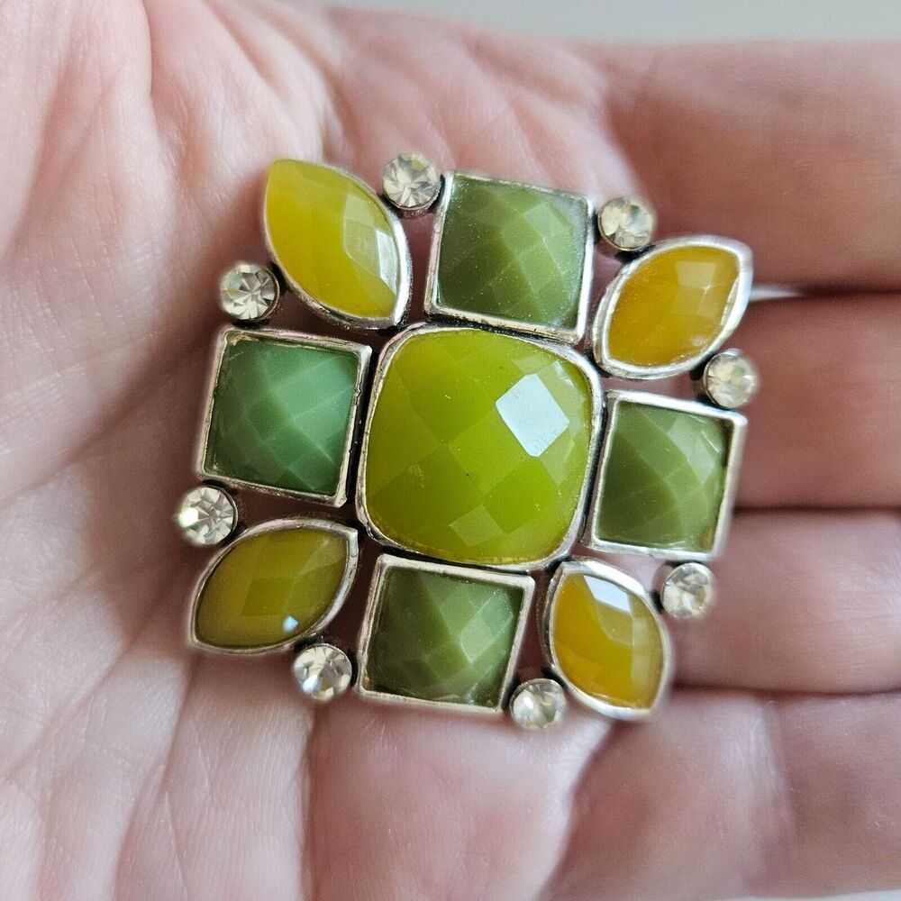 Silver tone green and yellow rhinestone brooch